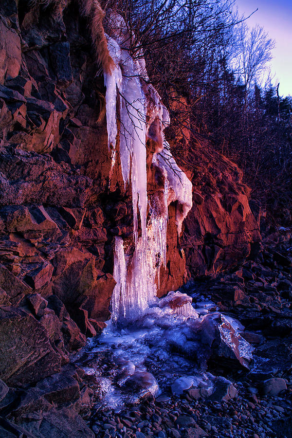 Coastal icicles in Last Sunlight Photograph by Irwin Barrett