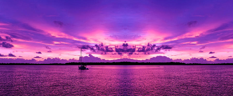  Coastal sunrise seascape in a purple sky.  Photograph by Geoff Childs