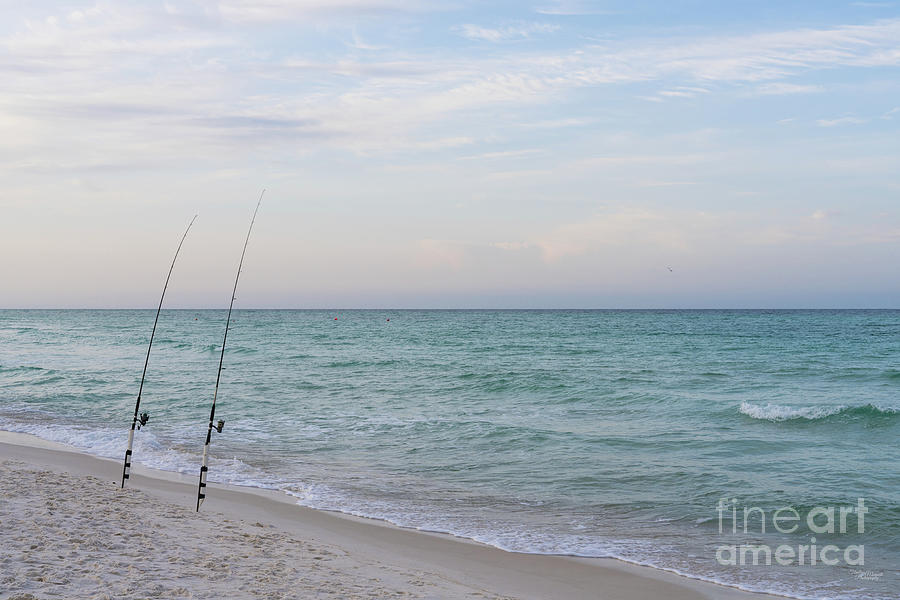 Coastline Fishing Poles In The Sand Photograph by Jennifer White