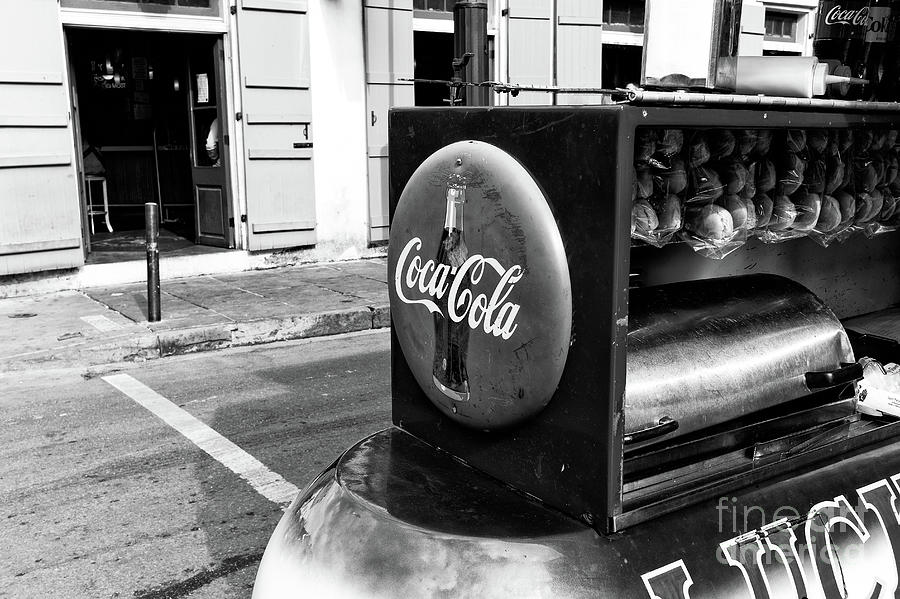 Coca Cola on Bourbon Street in New Orleans Photograph by John Rizzuto