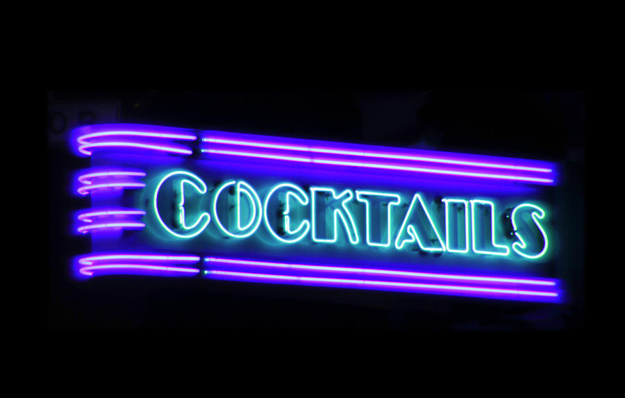 Cocktails Sign in Neon Photograph by Bonnie Follett