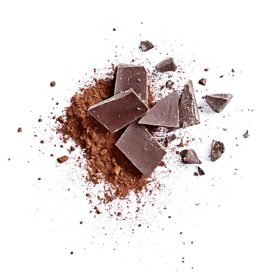 Cocoa powder and pieces of dark chocolate Photograph by Eivaisla