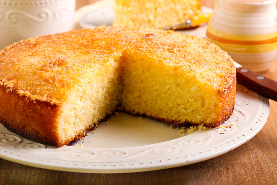 Coconut citrus syrup cake Photograph by Manyakotic