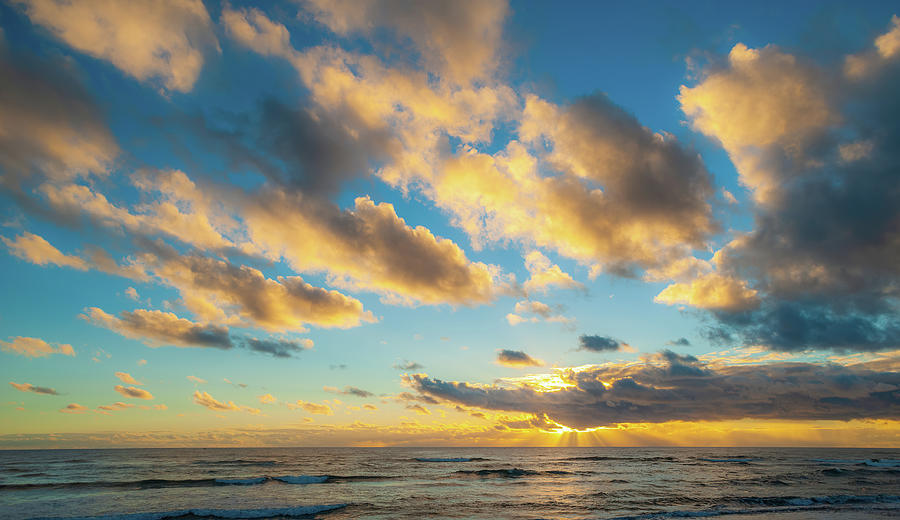 Coconut Coast Sunrise. Photograph by Doug Davidson