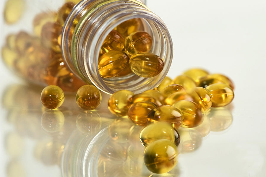 Cod liver oil capsules Photograph by By Sharaff