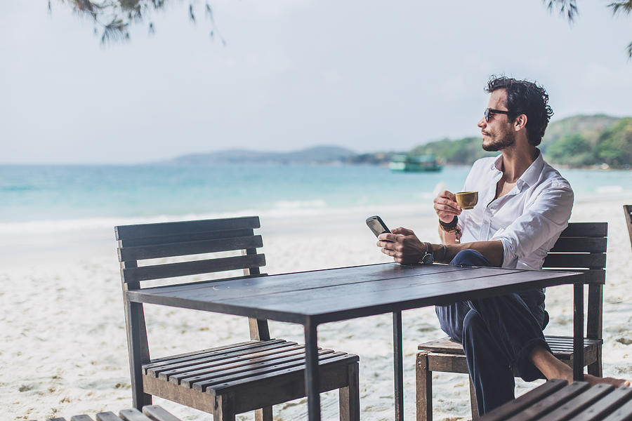 Coffee on the beach alone Photograph by South_agency