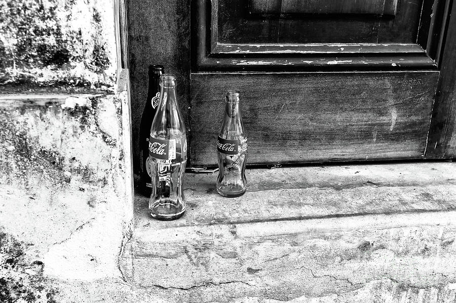 Coke Bottles on the Stoop in Panama City Photograph by John Rizzuto