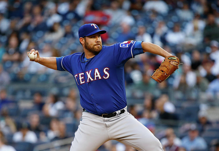Colby Lewis Photograph by Al Bello