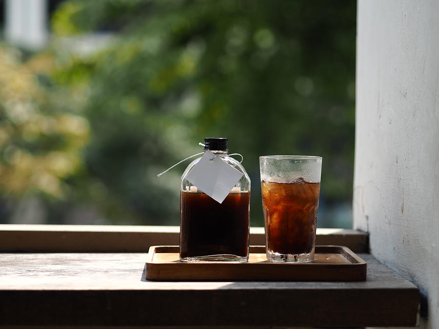 Cold brew coffeeo  wooden table Photograph by Hoai Qua