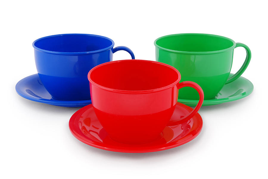 Collection of childrens toys cups (Clipping path) Photograph by Akova