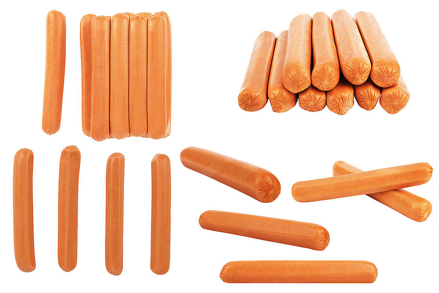 Collection of hot dog sausages isolated on a white. Photograph by MikeyGen73
