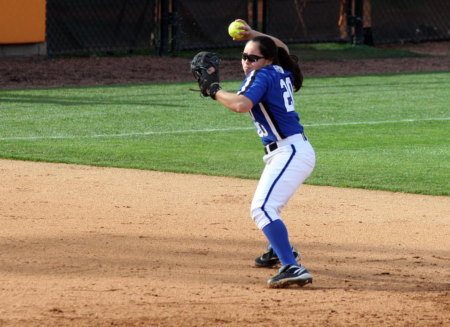 College Softball Player Throwing Photograph by ActionPics
