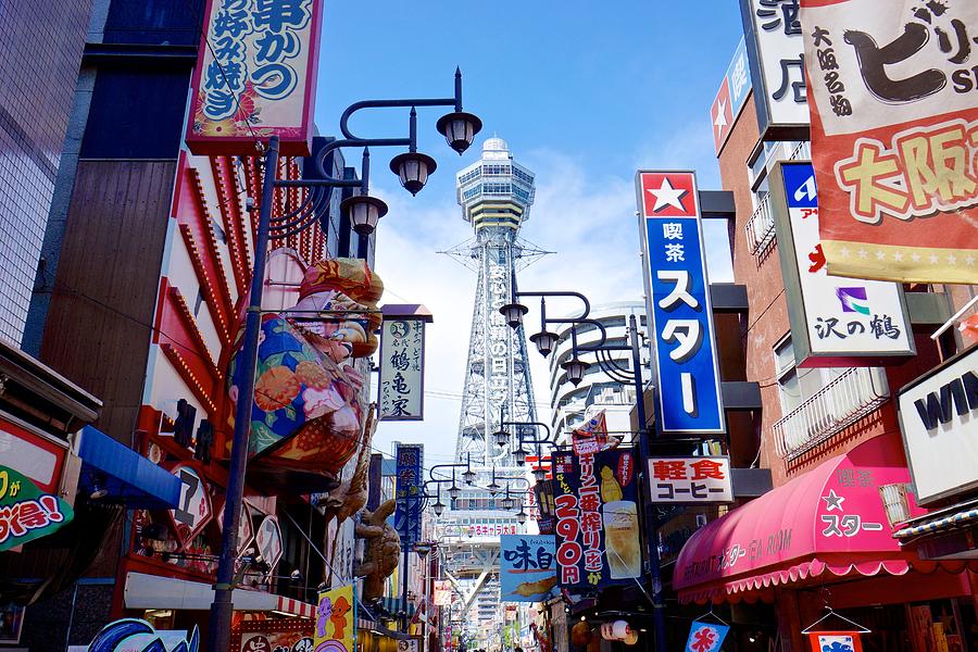 Color signs and Tsutenkaku Tower in south Osaka Photograph by Jake Jung
