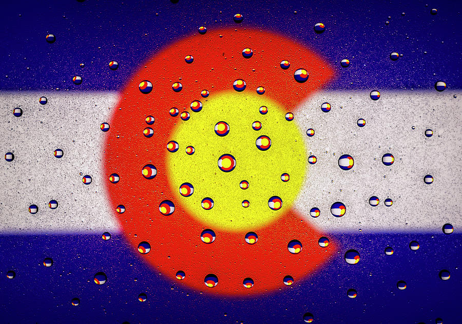 Colorado Flag in Water Droplets Photograph by Kevin Schwalbe