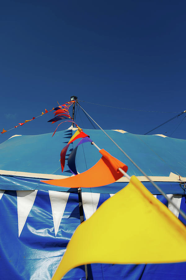 Colored pennants in a blue circus tent Photograph by Simon Mayer - Fine ...