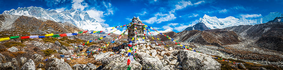 Colorful Buddhist prayer flags flying high in Himalaya mountains Nepal Photograph by fotoVoyager