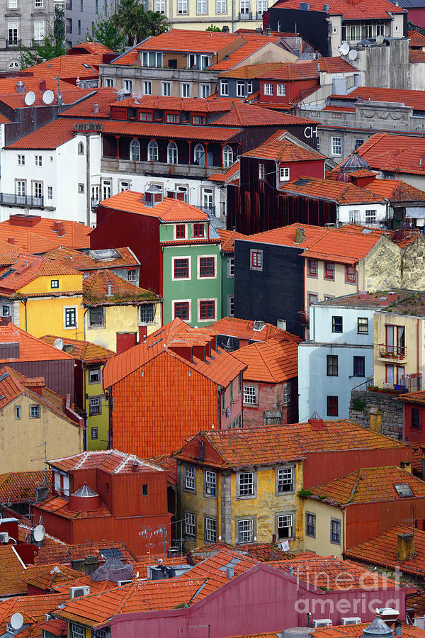 Architecture Photograph - Colorful buildings in the Ribeiro Old Town Porto Portugal by James Brunker