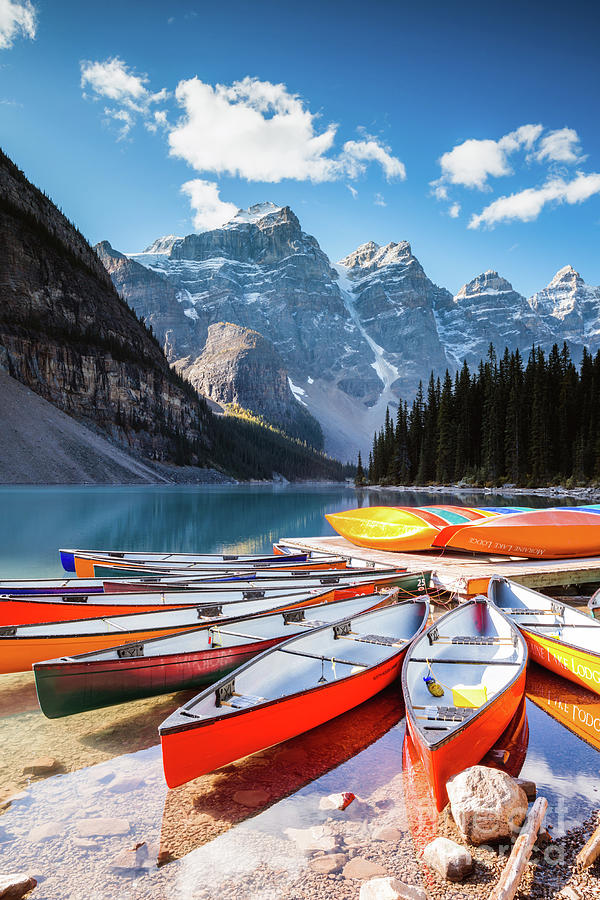 Colorful canoes, Moraine lake, Banff National Park, Canada Photograph by Matteo Colombo