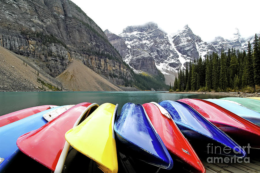 Colorful Canoes - Morraine Lake - Banff National Park - Alberta - Canada Photograph by Paolo Signorini