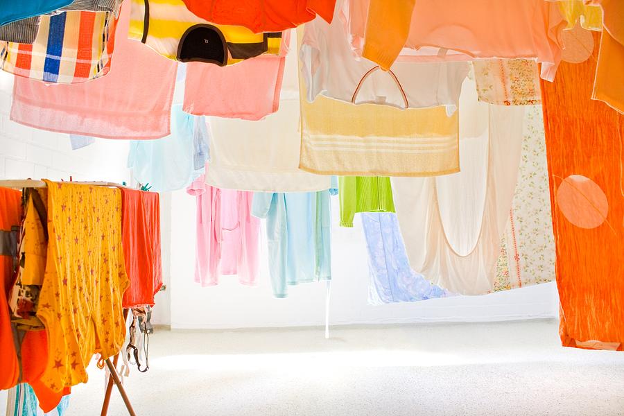 Colorful Clothes Drying On The Clothesline Photograph by Deepblue4you