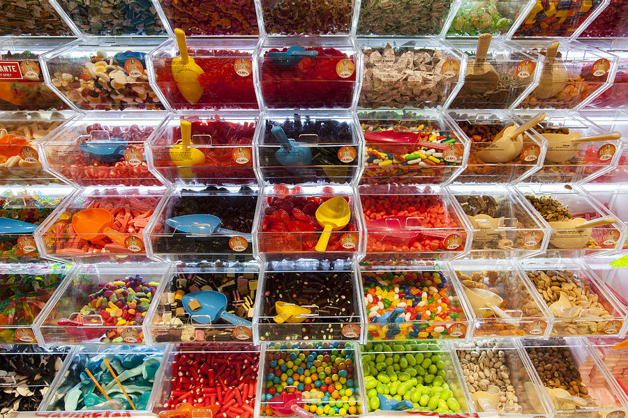 Colorful display of candy and sweets Photograph by Santiago Urquijo