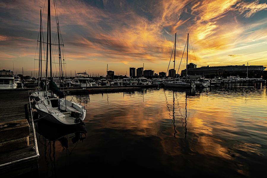 Colorful dusk sky by Chicagos Burham harbor Photograph by Sven Brogren