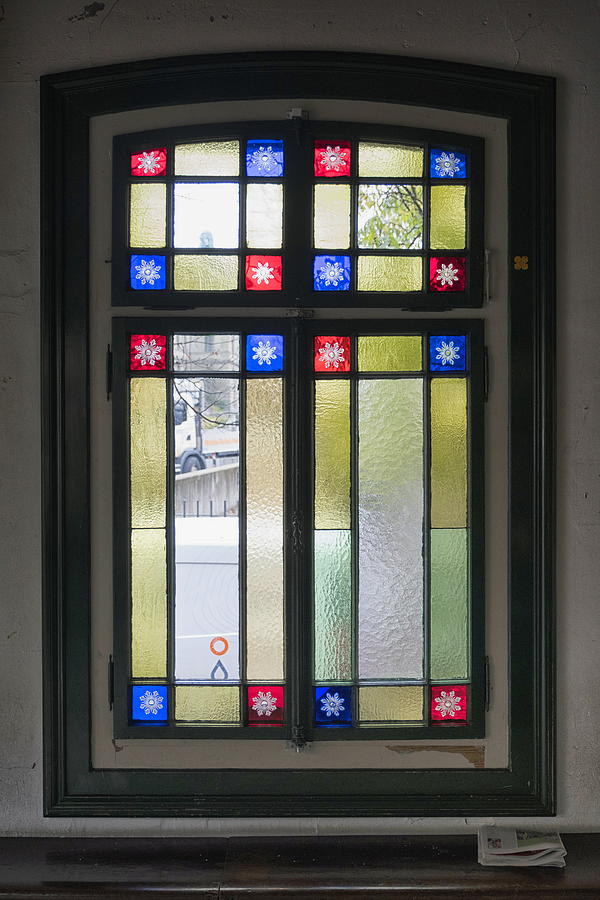 Colorful glass window details of polybahn building,Zurich. Photograph by Emreturanphoto