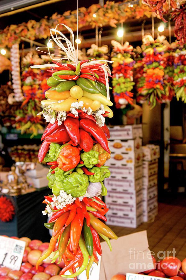 Colorful assortment of hanging peppers.  Photograph by Gunther Allen