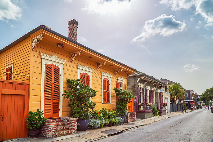 Colorful houses in French Quarter Photograph by Peter Unger