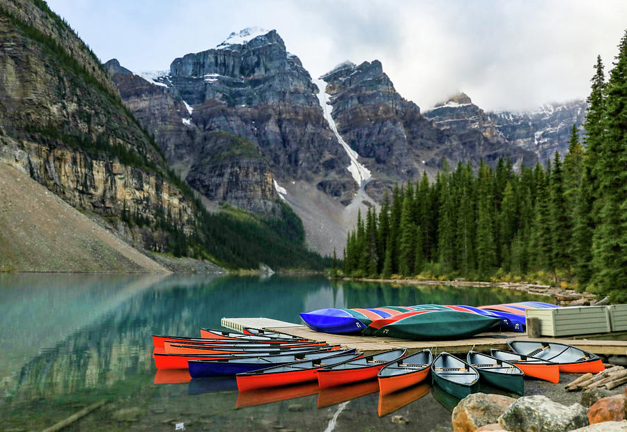 Colorful Kayaks On Moraine Lake Photograph by Dan Sproul