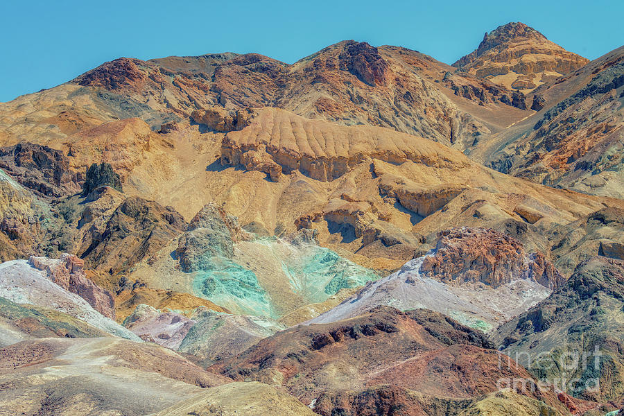 Colorful rocks at the Artists Palette in Death Valley, CA Photograph by Hanna Tor