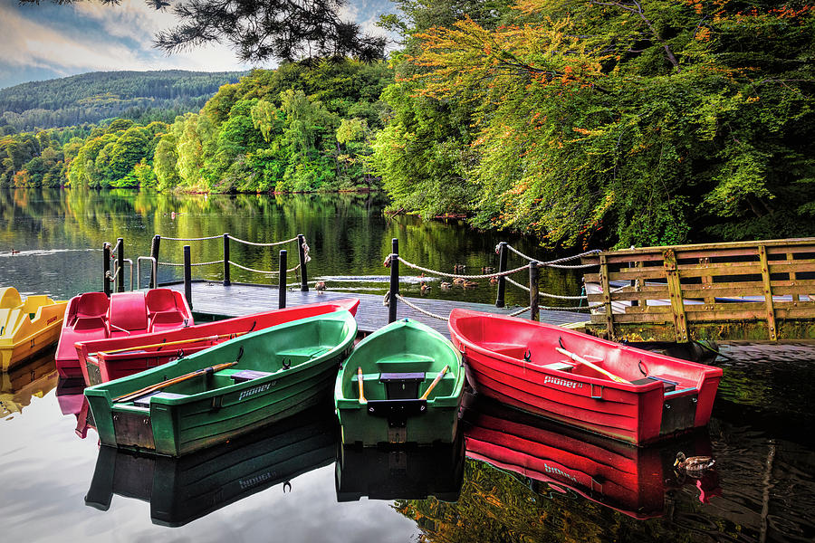 Colorful Rowboats in the Lake Photograph by Debra and Dave Vanderlaan