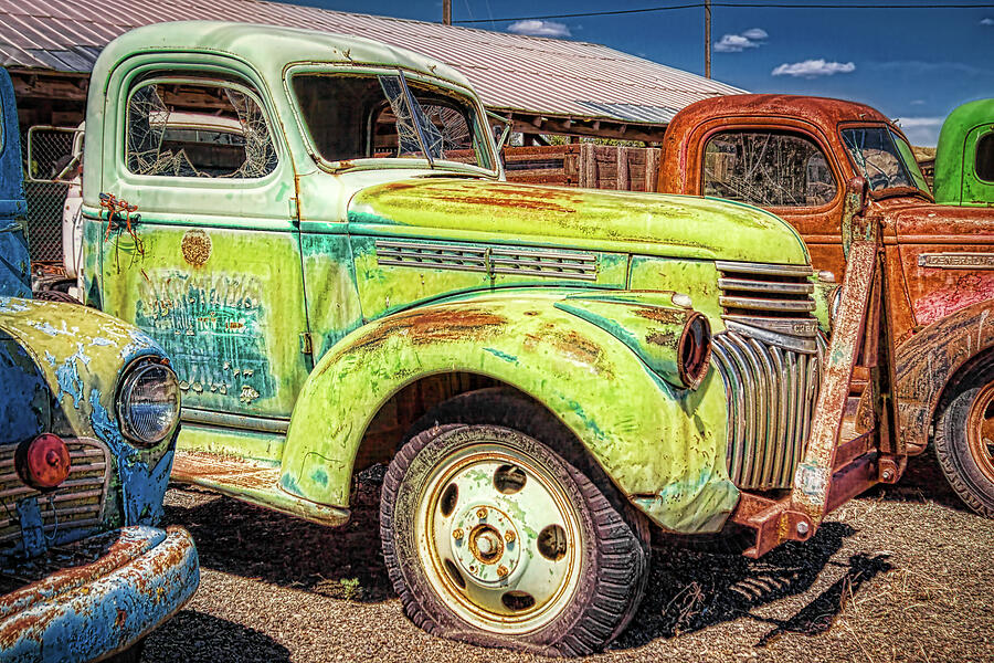 Colorful rusty trucks Photograph by Tatiana Travelways
