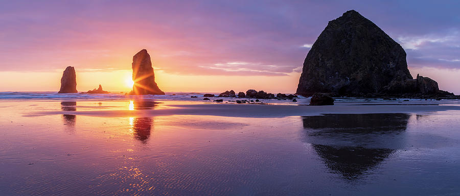 Colorful Sunset at Cannon Beach  Photograph by Joan Escala-Usarralde