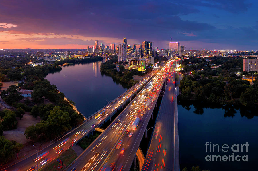 Austin Skyline Photograph - Colorful sunset over the Austin skyline as IH-35 traffic flows through downtown by Dan Herron