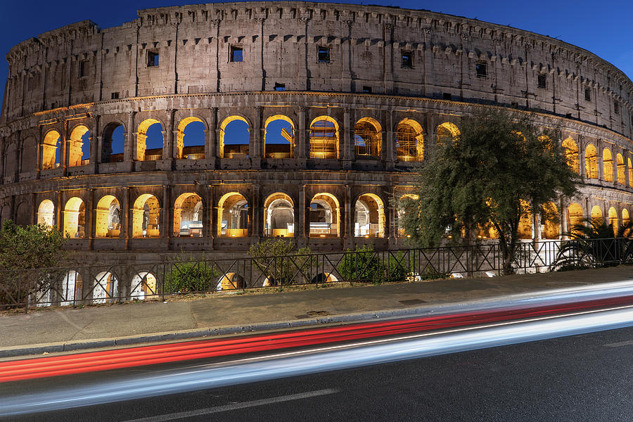 Colosseum And Light Trails Photograph by Artur Bogacki
