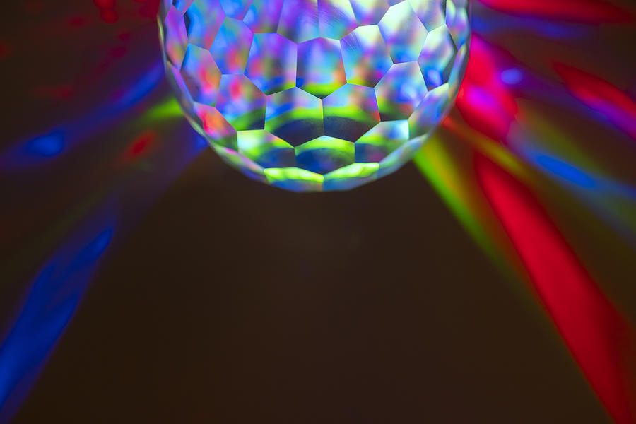 Coloured Light Through A Multi Faceted Crystal Photograph by Catherine MacBride