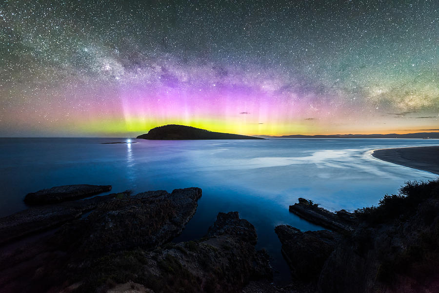 Colourful display of the Aurora Australis over an island in the ocean at Blue Hour Photograph by Chasing Light - Photography by James Stone james-stone.com