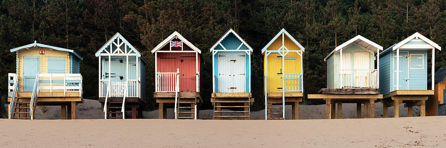 Colourful English Beach huts Photograph by Sonny Ryse