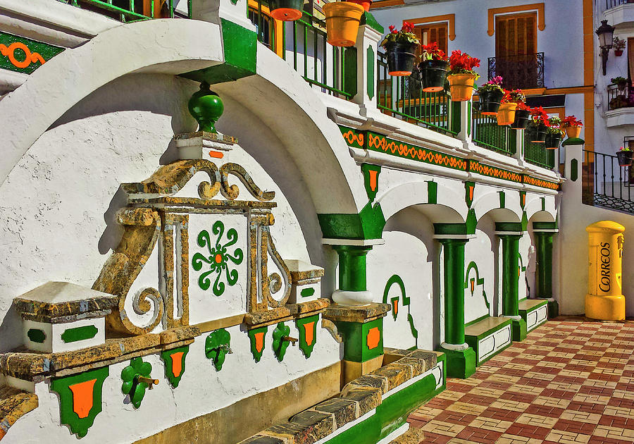 Colourful Fountain and tile work in the Main Square, Competa, Malaga Province. Andalucia, Spain Photograph by Panoramic Images