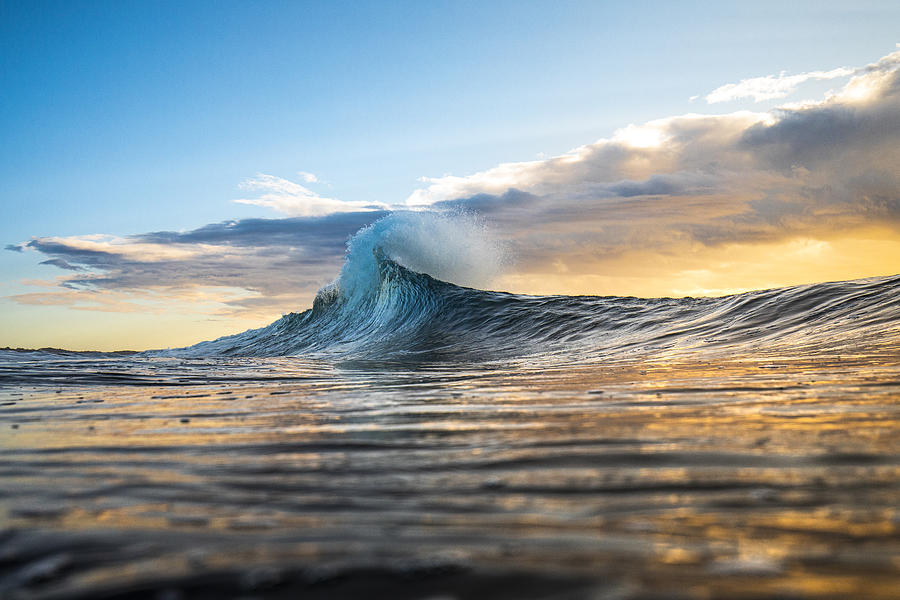Colourful wave peaking into a flare with sunrise storm Photograph by Lindsay_imagery