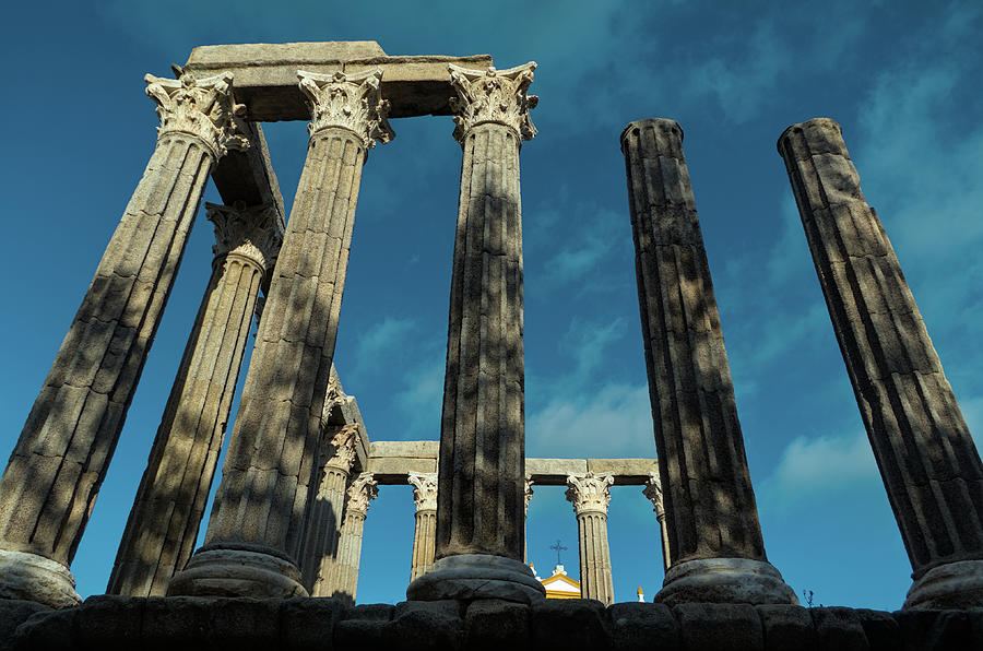 Columns of the Roman temple of Evora Photograph by Angelo DeVal