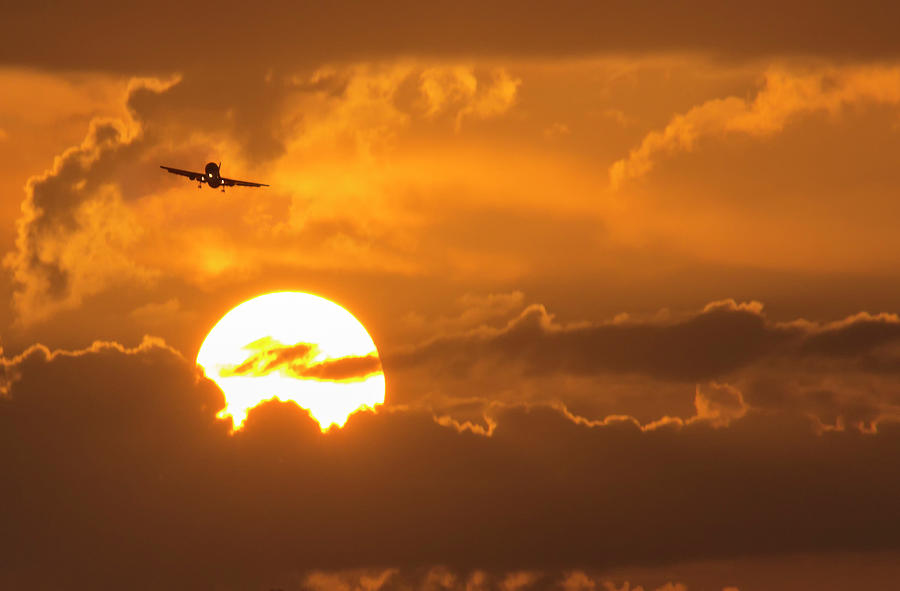 Summer Photograph - Commercial Aircraft On Approach Above Large Summer Sun by Ricardo Reitmeyer