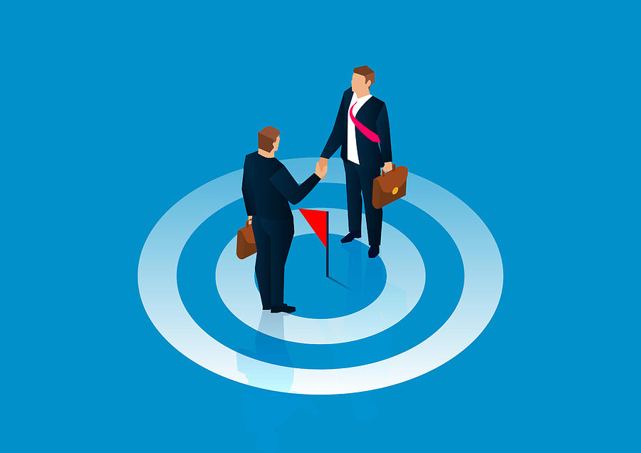 Common goal, reach agreement, two businessmen stand on the bullseye and shake hands Drawing by Sesame
