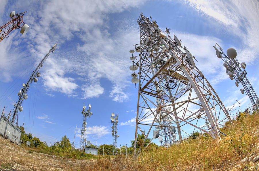 Communication antenna towers in fish-eye perspective Photograph by Phadventure