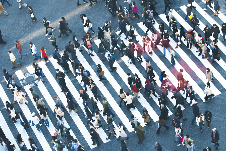 Commuters walking at Shibuya Crossing, Tokyo Photograph by © Marco Bottigelli