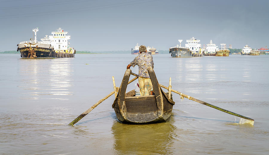 Commuting on the Karnaphuli River Photograph by Alexey Stiop