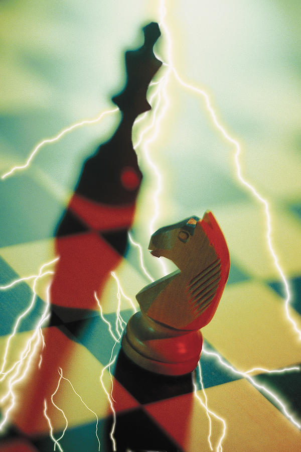 Composite of lightning bolts and chess board with pieces Photograph by Comstock