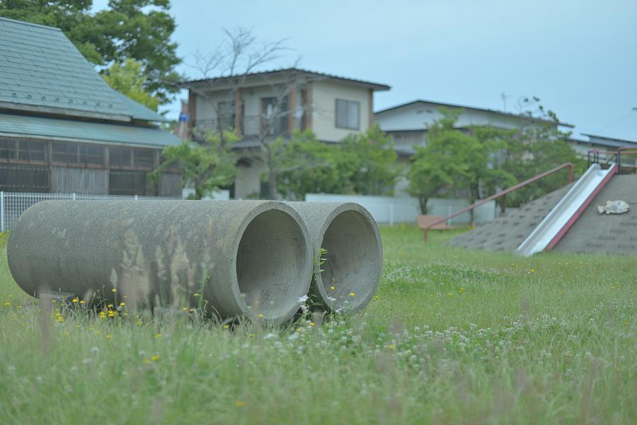 Concrete drainpipes on the park Photograph by Photo by Kosei Saito