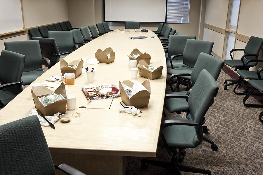Conference room table with take out lunches Photograph by Mint Images